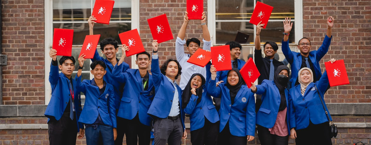 LOYLA students celebrating their graduation in London